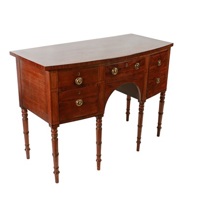 Lot 1497 - A Georgian mahogany bowfront sideboard