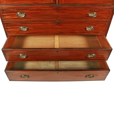Lot 77 - A late George III mahogany tray wardrobe or press