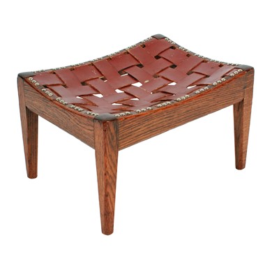 Lot 42 - A George V oak and leather stool by Arthur Simpson of Kendal