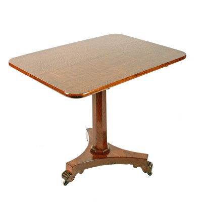 Lot 45 - An early Victorian oak tilt action supper table