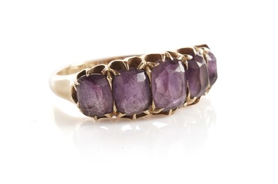 Lot 48 - An amethyst five stone dress ring