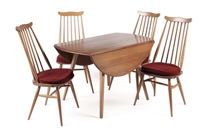Lot 818 - An Ercol elm and beech dining room suite