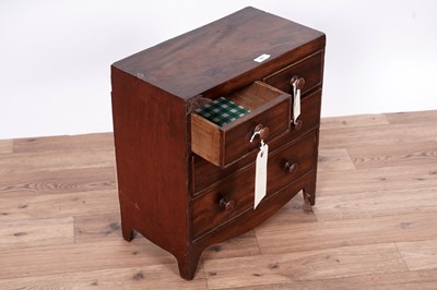 Lot 31 - A George III miniature mahogany chest of drawers
