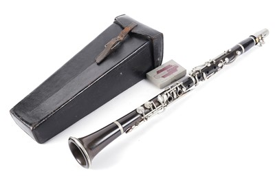 Lot 243 - An clarinet in fitted leather case