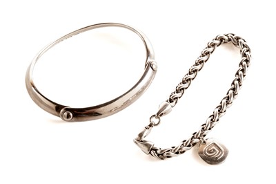 Lot 102 - A Georg Jensen silver bangle; and a George Jensen bracelet
