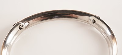 Lot 102 - A Georg Jensen silver bangle; and a George Jensen bracelet