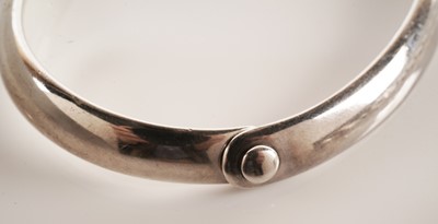 Lot 102 - A Georg Jensen silver bangle; and a George Jensen bracelet