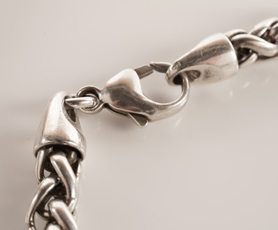 Lot 102 - A Georg Jensen silver bangle; and a George Jensen bracelet