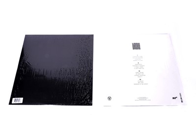 Lot 32 - A signed copy of Tricky - False Idols LP and 12" single