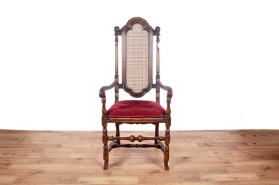 Lot 67 - Two late 19th/early 20th Century Jacobean style carved oak armchairs