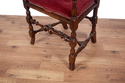Lot 67 - Two late 19th/early 20th Century Jacobean style carved oak armchairs
