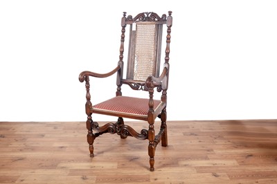 Lot 67 - Two late 19th/early 20th Century Jacobean style carved oak armchairs