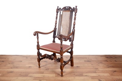 Lot 67 - Two late 19th/early 20th Century Jacobean style carved oak armchairs