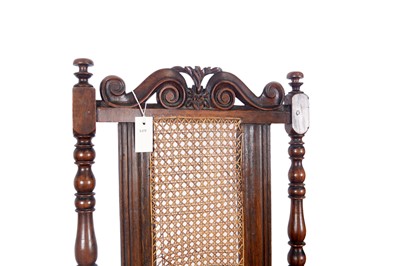 Lot 67 - Two late 19th/early 20th Century Jacobean style carved oak armchairs