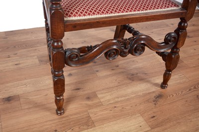 Lot 67 - Two late 19th/early 20th Century Jacobean style carved oak armchairs