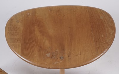 Lot 779 - An Ercol model 354 ‘Pebble’ nest of three elm-topped tables