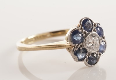 Lot 46 - A sapphire and diamond flower cluster ring