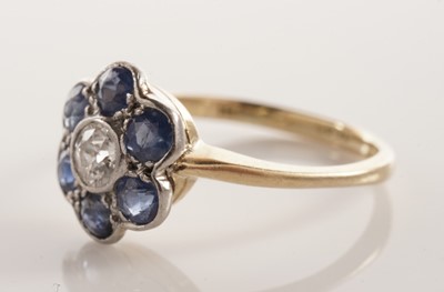 Lot 46 - A sapphire and diamond flower cluster ring