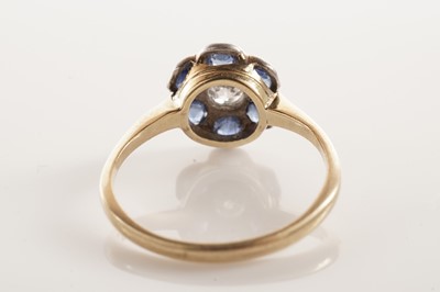 Lot 46 - A sapphire and diamond flower cluster ring