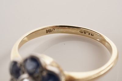 Lot 46 - A sapphire and diamond flower cluster ring