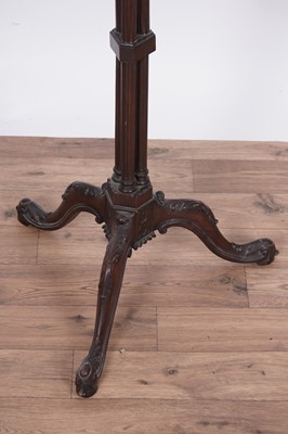 Lot 106 - A 19th Century carved mahogany urn/kettle stand.