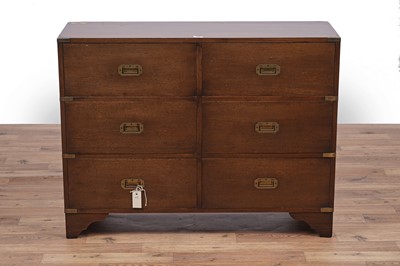 Lot 40 - N. H. Chapman & Co. Ltd: a mahogany campaign style ‘Siesta’ range chest of drawers