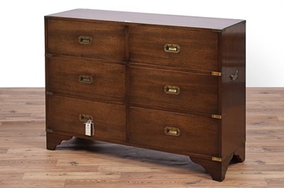 Lot 40 - N. H. Chapman & Co. Ltd: a mahogany campaign style ‘Siesta’ range chest of drawers