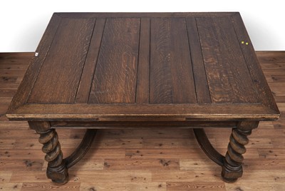 Lot 49 - A set of six oak and leather dining chairs; and a carved oak draw leaf dining table