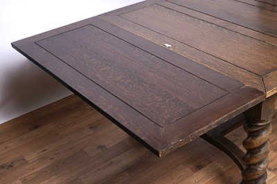 Lot 49 - A set of six oak and leather dining chairs; and a carved oak draw leaf dining table