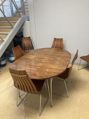 Lot 781 - A Hans Brattrud dining table; and six Hans Brattrud 'Scandia' chairs
