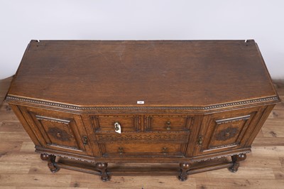 Lot 107 - An early 20th Century Lees style carved oak sideboard