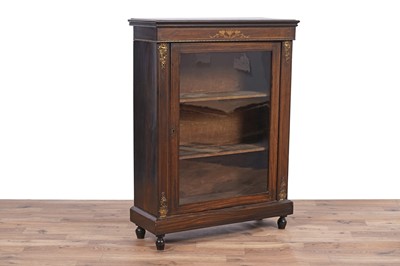 Lot 100 - A Victorian inlaid walnut and brass mounted pier cabinet