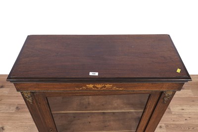 Lot 100 - A Victorian inlaid walnut and brass mounted pier cabinet