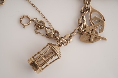 Lot 10 - A yellow gold charm bracelet