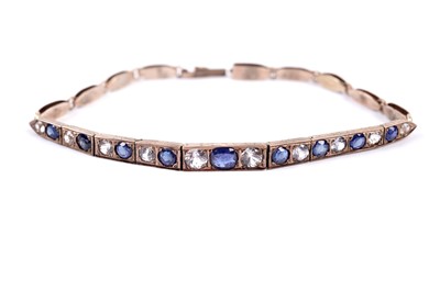 Lot 64 - A blue and white sapphire bracelet
