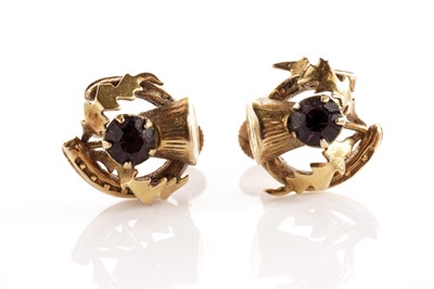 Lot 50 - A pair of thistle pattern screw back earrings