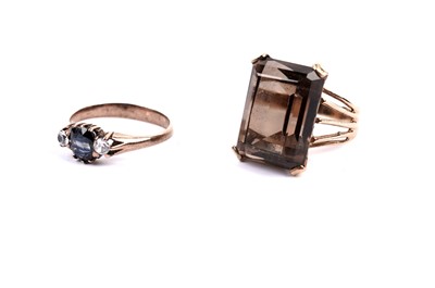 Lot 40 - A parti-colour and white sapphire dress ring; and a smoky quartz ring