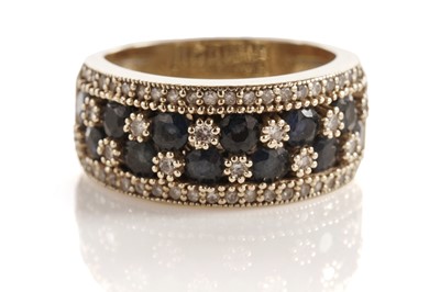 Lot 70 - A sapphire and diamond dress ring