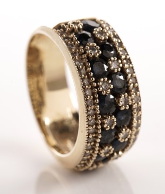 Lot 70 - A sapphire and diamond dress ring