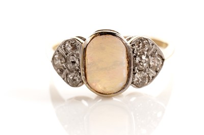 Lot 69 - An opal and diamond ring