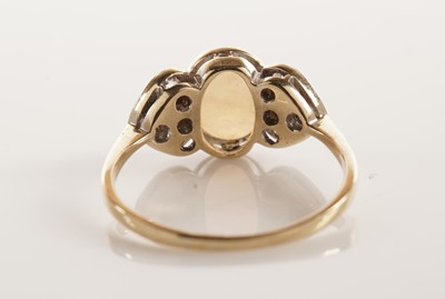 Lot 69 - An opal and diamond ring