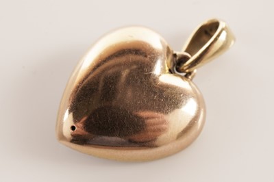 Lot 91 - A split pearl and enamel heart-shaped pendant
