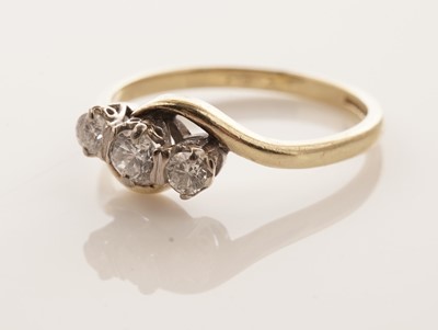 Lot 22 - A diamond trilogy ring