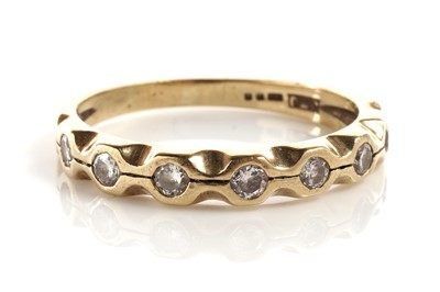 Lot 177 - A diamond half eternity ring
