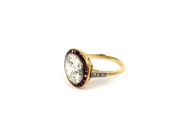 Lot 889 - A diamond and ruby cluster ring