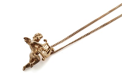 Lot 15 - A 9ct yellow gold Cupid pendant charm; and a 9ct yellow gold chain necklace