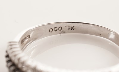 Lot 105 - Two diamond and black diamond rings