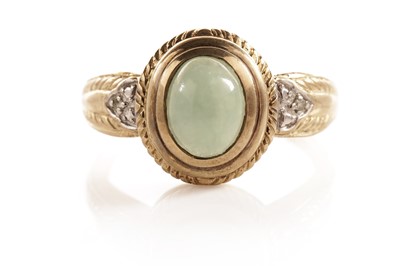 Lot 109 - A jadeite and diamond dress ring