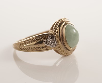 Lot 109 - A jadeite and diamond dress ring