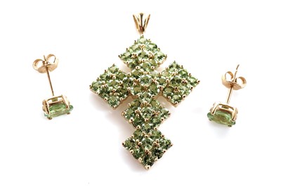 Lot 131 - A tsavorite garnet crucifix pendant and earrings